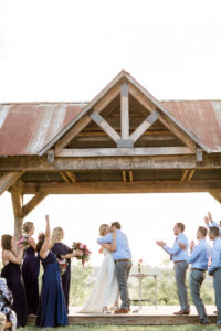 Outdoor ceremony at Corner House B&B in Rockport, IN. Photographed by Morgan Williams Photography.