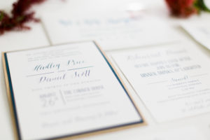 Navy and tan invitation suite. Photographed by Morgan Williams Photography