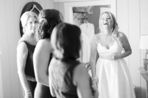 Bride laughing. Photographed by Morgan Williams Photography.