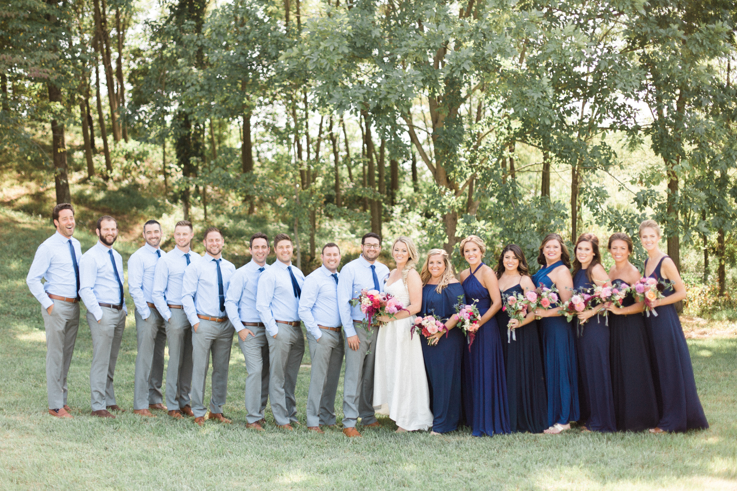 Bridal party photos, navy bridesmaids dresses. Photographed by Morgan Williams Photography.
