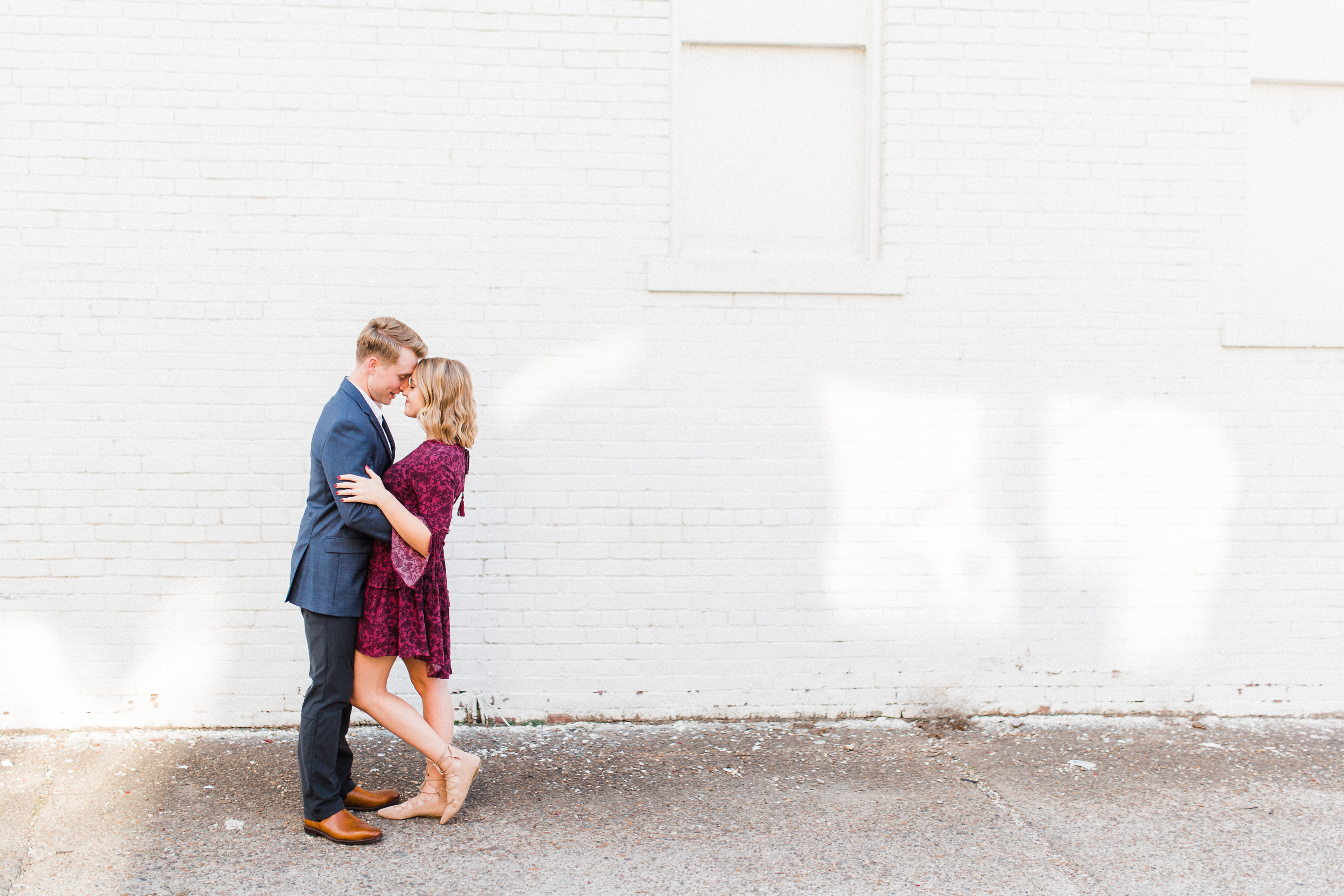 Urban engagement shoot in Downtown Evansville. Photographed by Morgan Williams Photography.