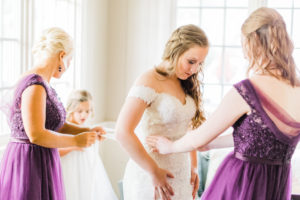 Bride getting ready with bridesmaids at The Fehn House