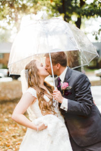 Rainy wedding day photo. Photographed by Morgan Williams Photography.